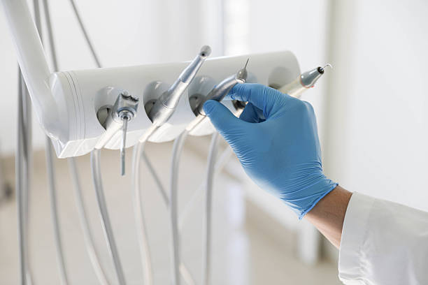 Professional Tooth Extraction technician working in Brentwood, MO